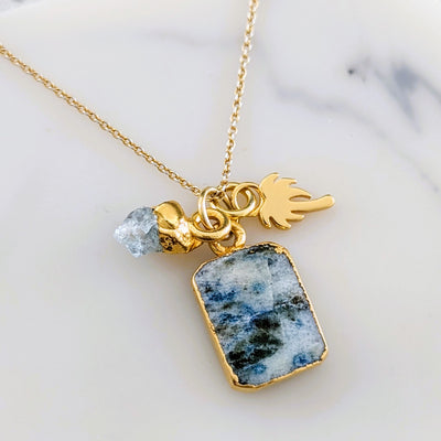Gold plated K2, aquamarine and palm tree gemstone necklace
