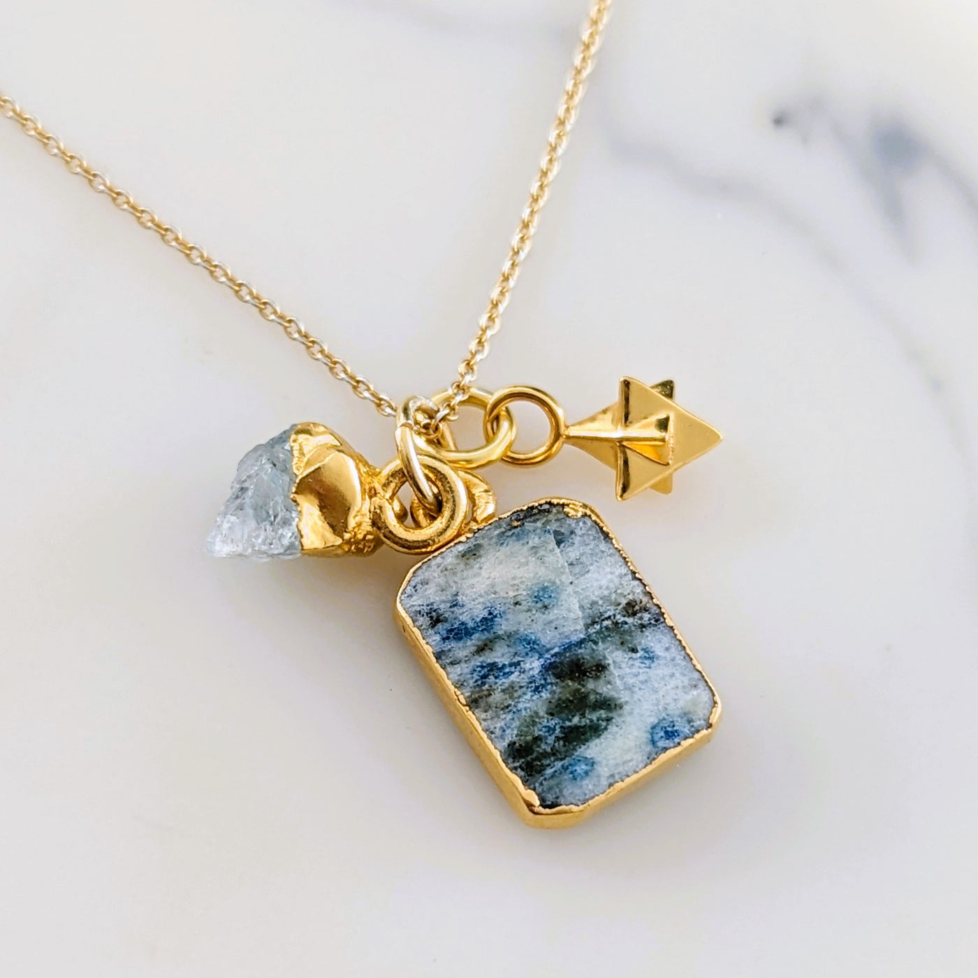 Gold plated K2, aquamarine and tetrahedron star gemstone necklace