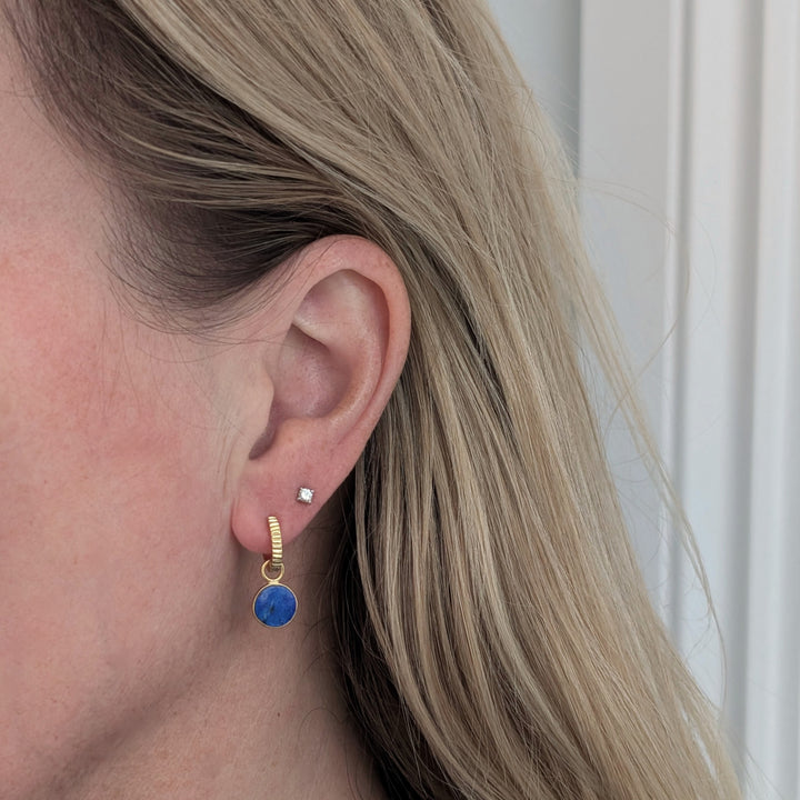 gold hoop earrings with lapis lazuli circular charms