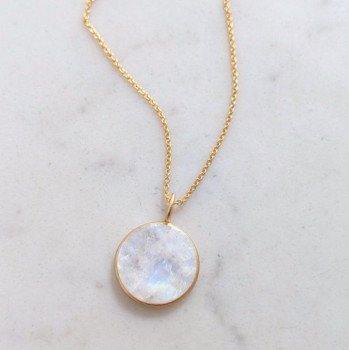 gold circular pendant moonstone June birthstone pendant necklace