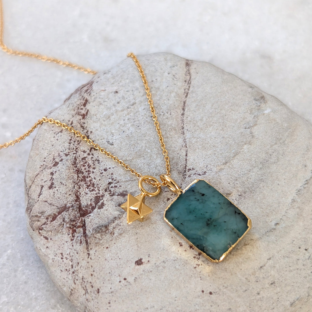 gold emerald rectangular slice pendant necklace with tetrahedron star charm