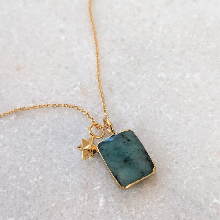 gold emerald rectangular slice pendant necklace with tetrahedron star charm