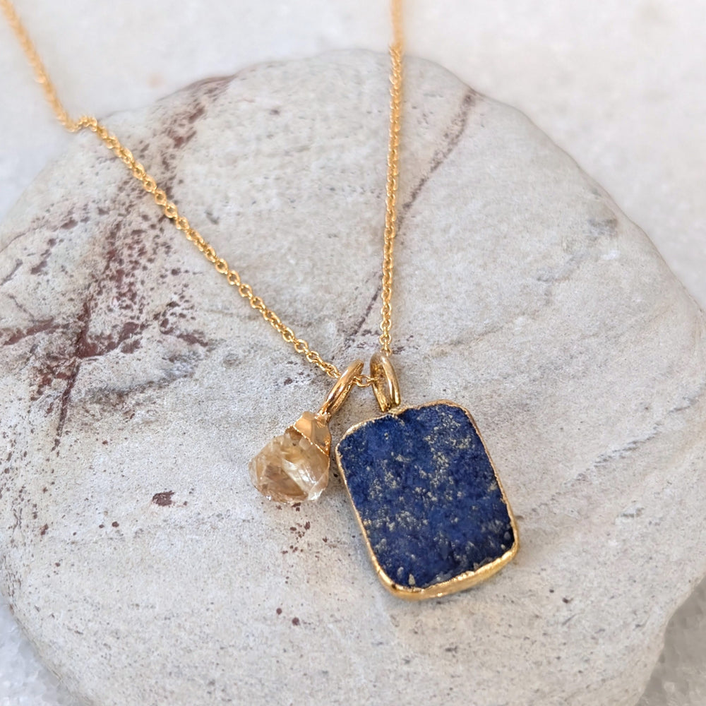 gold plated sterling lapis lazuli pendant and charm necklace