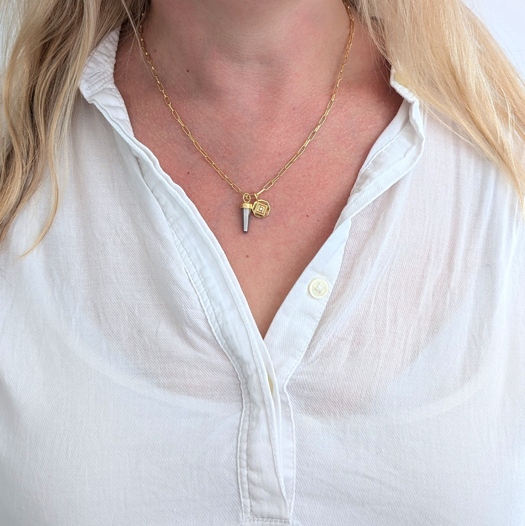 gold paperclip necklace with pyrite gemstone point pendant and gold disc charm