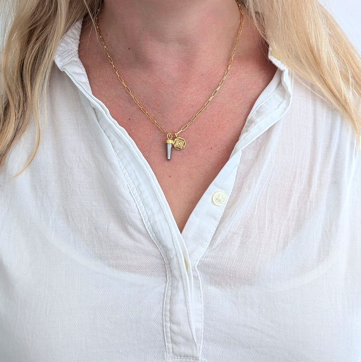gold paperclip necklace with pyrite gemstone point pendant and gold disc charm