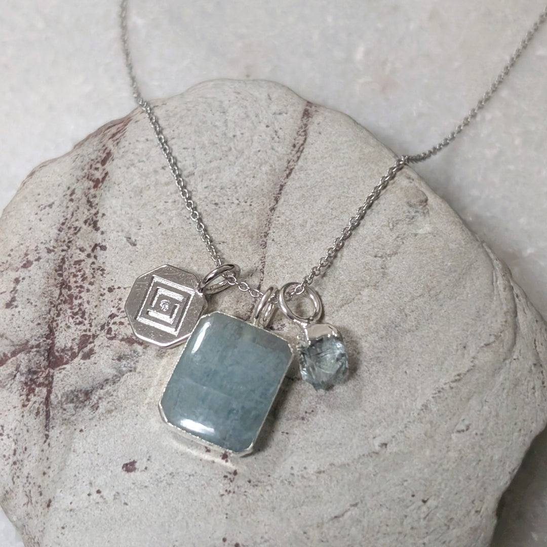 sterling silver aquamarine and charm pendant necklace