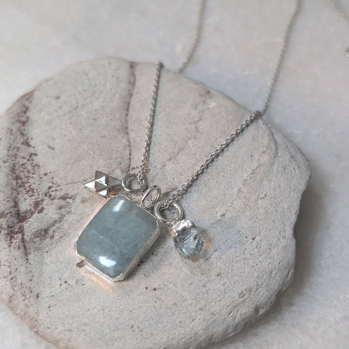 sterling silver aquamarine and charm pendant necklace
