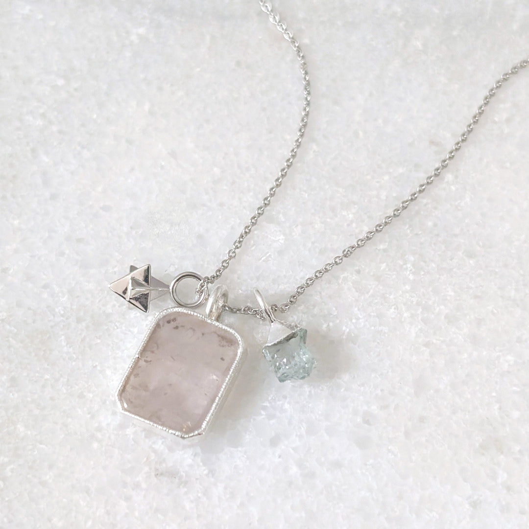 sterling silver necklace with rose quartz rectangular pendant, aquamarine tumblestone and charm 