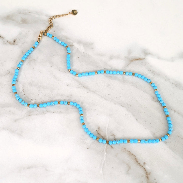 turquoise gemstone and gold bead necklace 