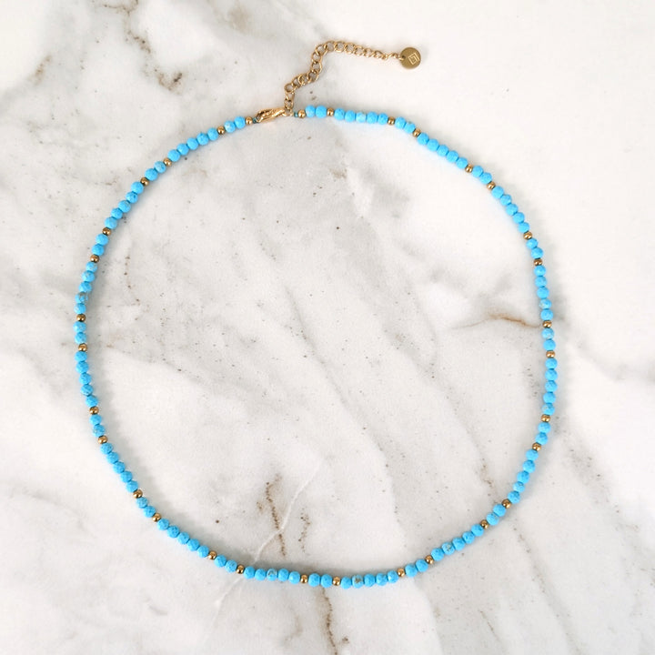 turquoise gemstone and gold bead necklace 