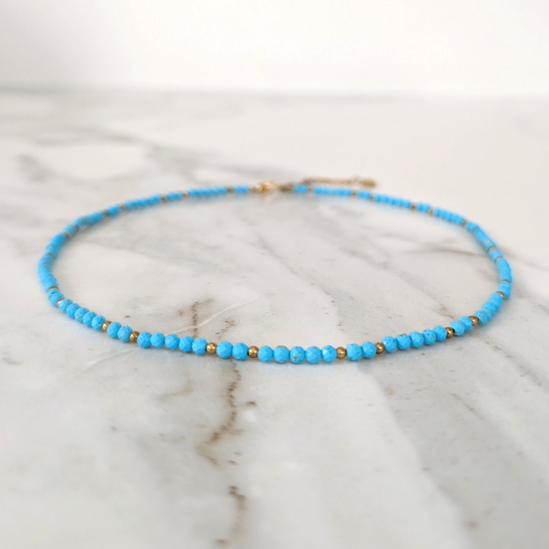 turquoise gemstone and gold bead necklace 