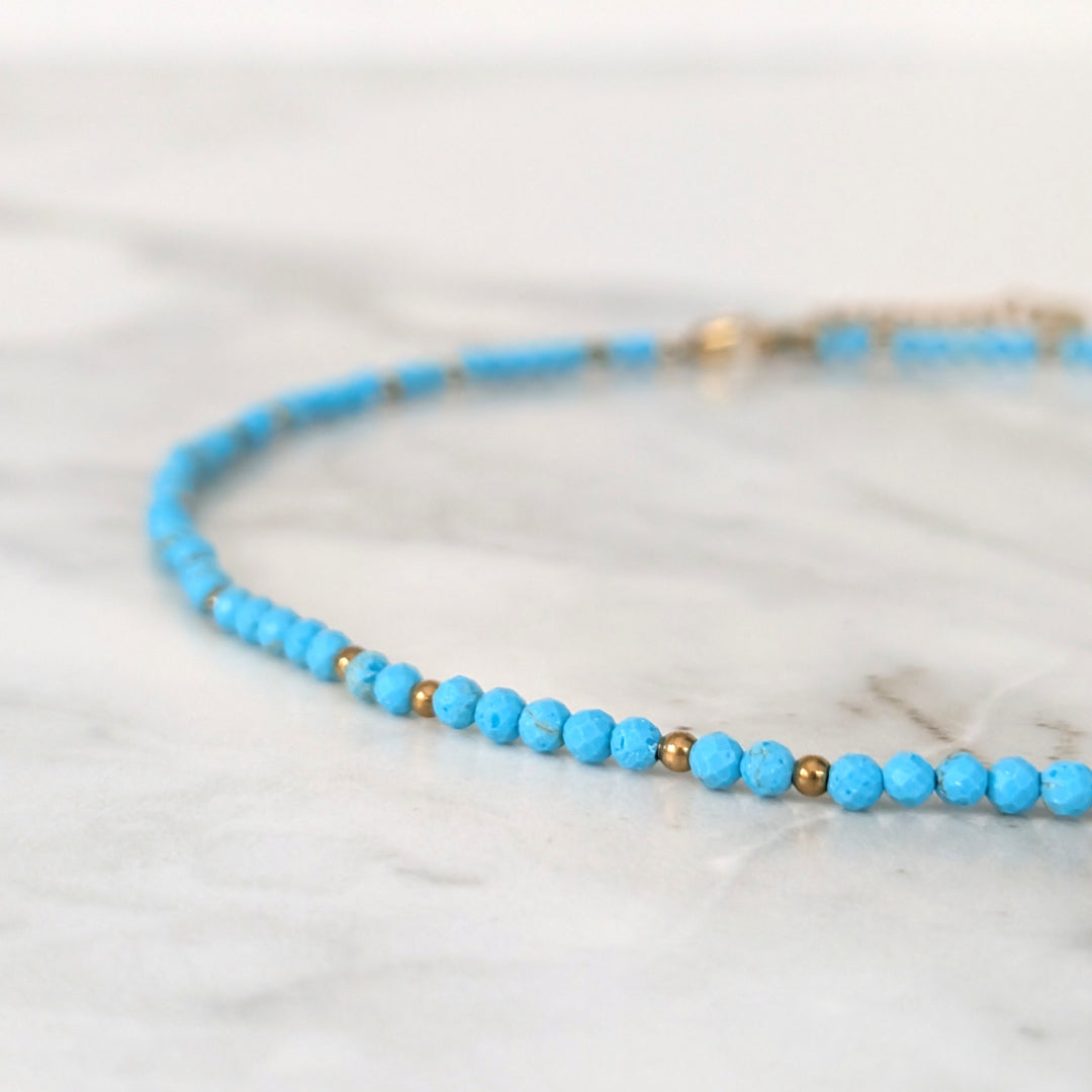 turquoise gemstone and gold bead necklace 