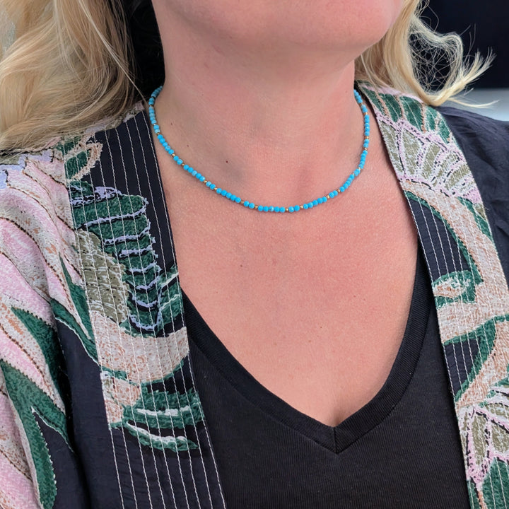 turquoise gemstone and gold bead necklace 