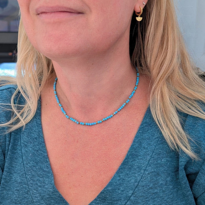 turquoise gemstone and gold bead necklace