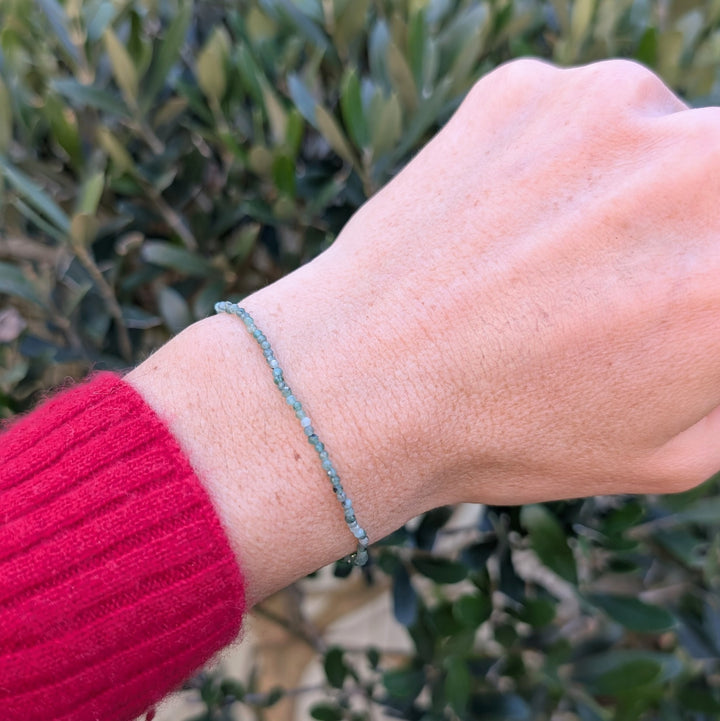 Green emerald 2mm faceted bead bracelet with a sterling silver disc