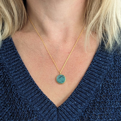 emerald circular pendant necklace