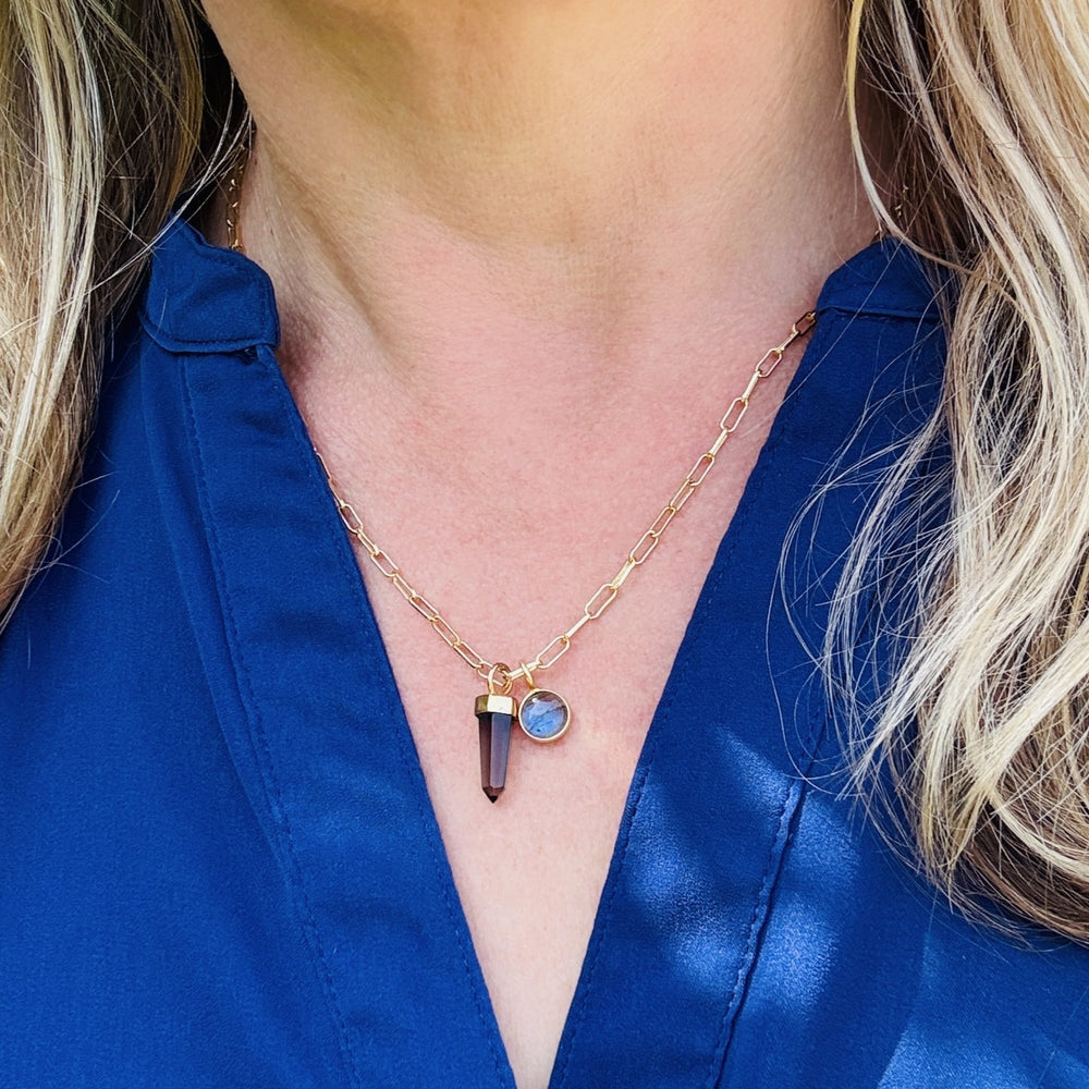 Gold paperclip necklace with a smoky quartz spike pendant and labradorite charm