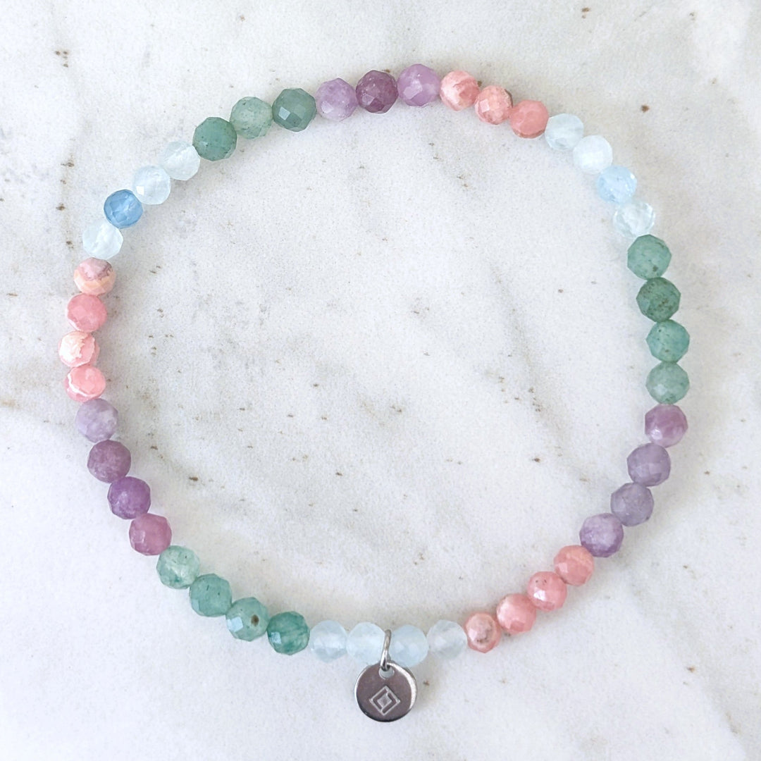 good luck and new ventures gemstone intention bracelet, comprising lepidolite, rhodochrosite, green aventurine and aquamarine faceted beads 