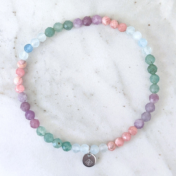 good luck and new ventures gemstone intention bracelet, comprising lepidolite, rhodochrosite, green aventurine and aquamarine faceted beads 