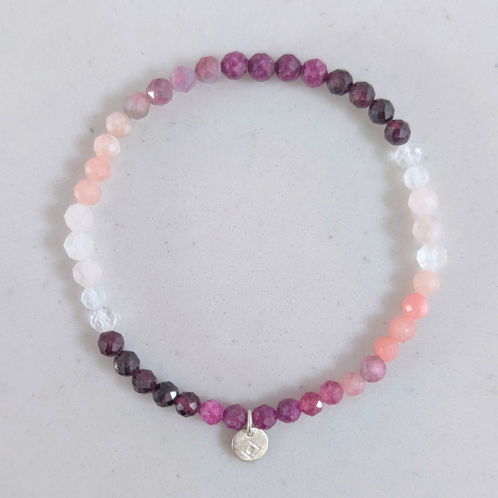 clear quartz, moonstone, rose quartz, pink opal, pink tourmaline, garnet and ruby beaded gemstone bracelet 