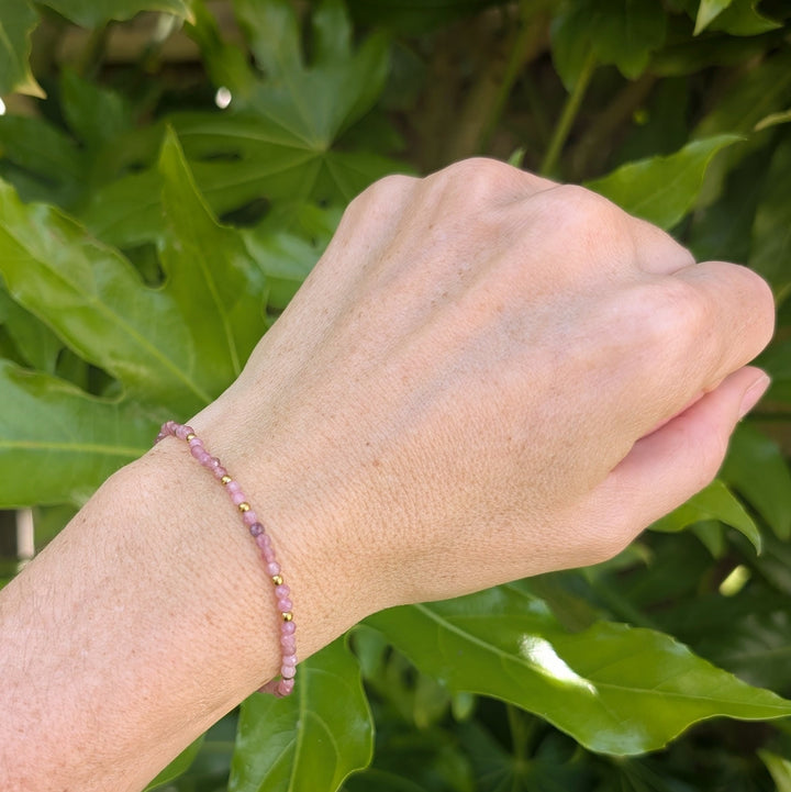 pink tourmaline gemstone and gold bead bracelet 