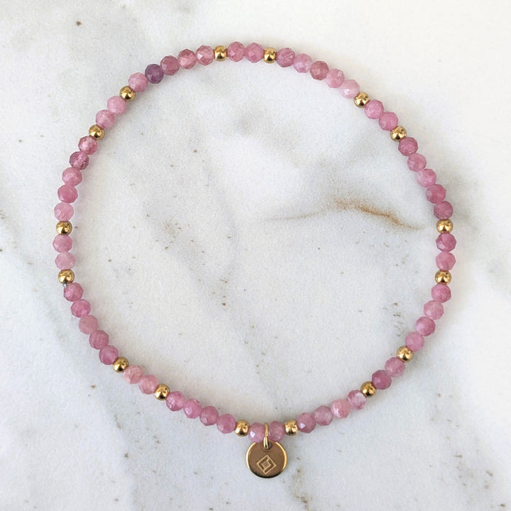 pink tourmaline gemstone and gold bead bracelet 