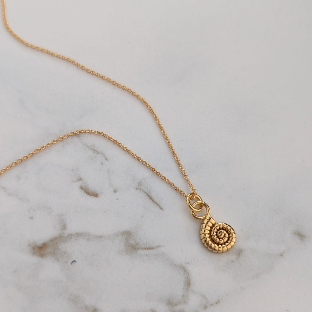 Gold ammonite necklace 