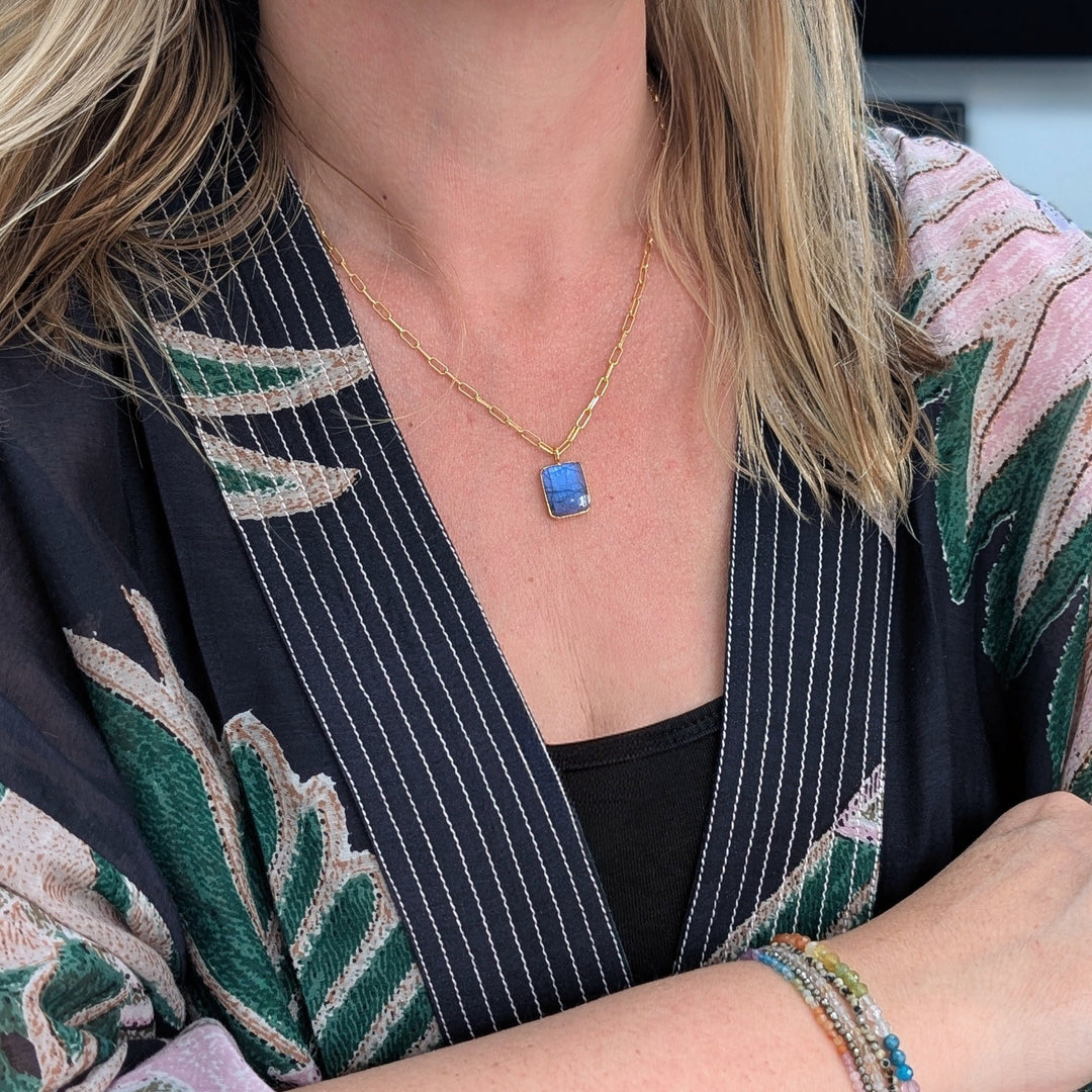 Gold paperclip chain with a rectangular labradorite pendant