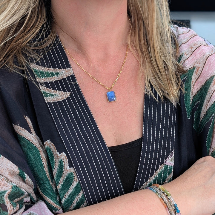 Gold paperclip chain with a rectangular labradorite pendant