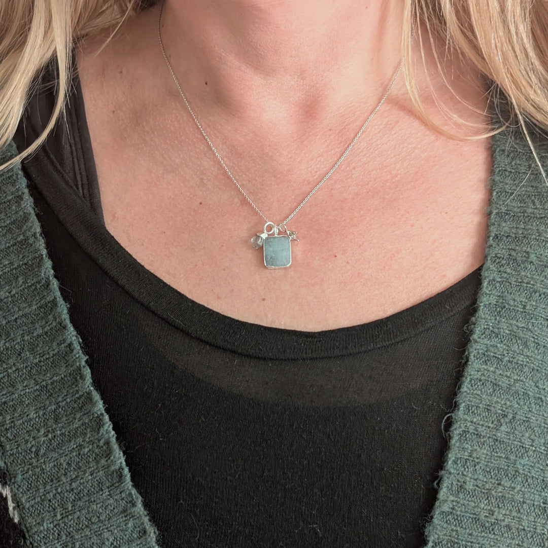 sterling silver aquamarine and charm pendant necklace