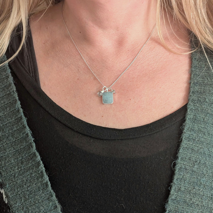 sterling silver aquamarine and charm pendant necklace