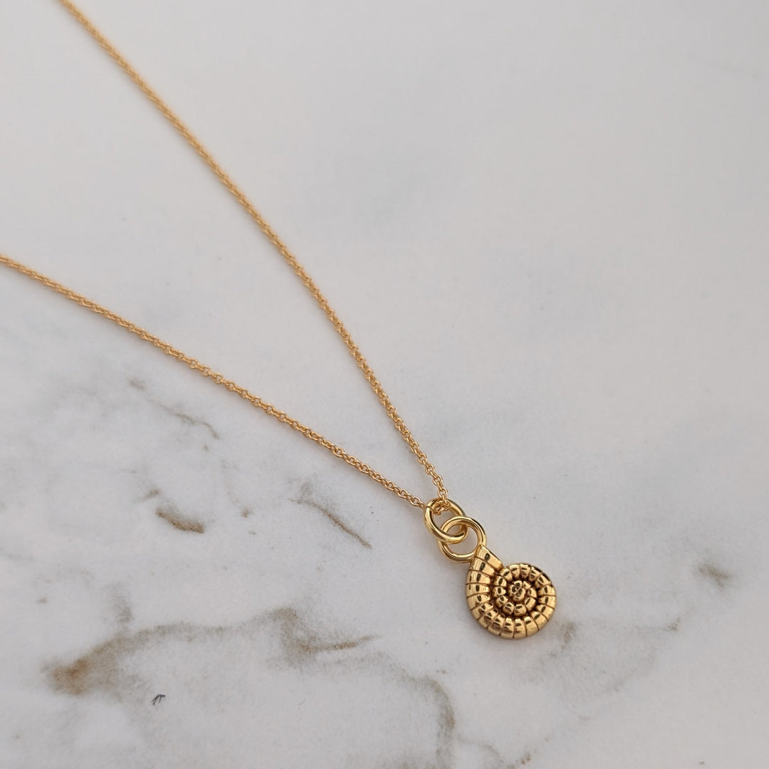 Gold ammonite necklace 