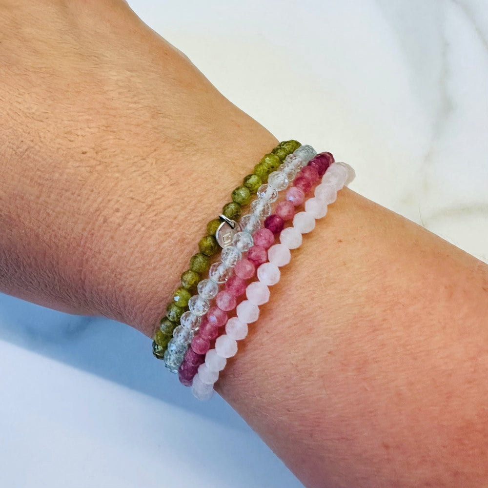 Celebrate friendship gemstone intention bracelet set. Peridot, rose quartz, blue topaz and peridot gemstone bracelets. 