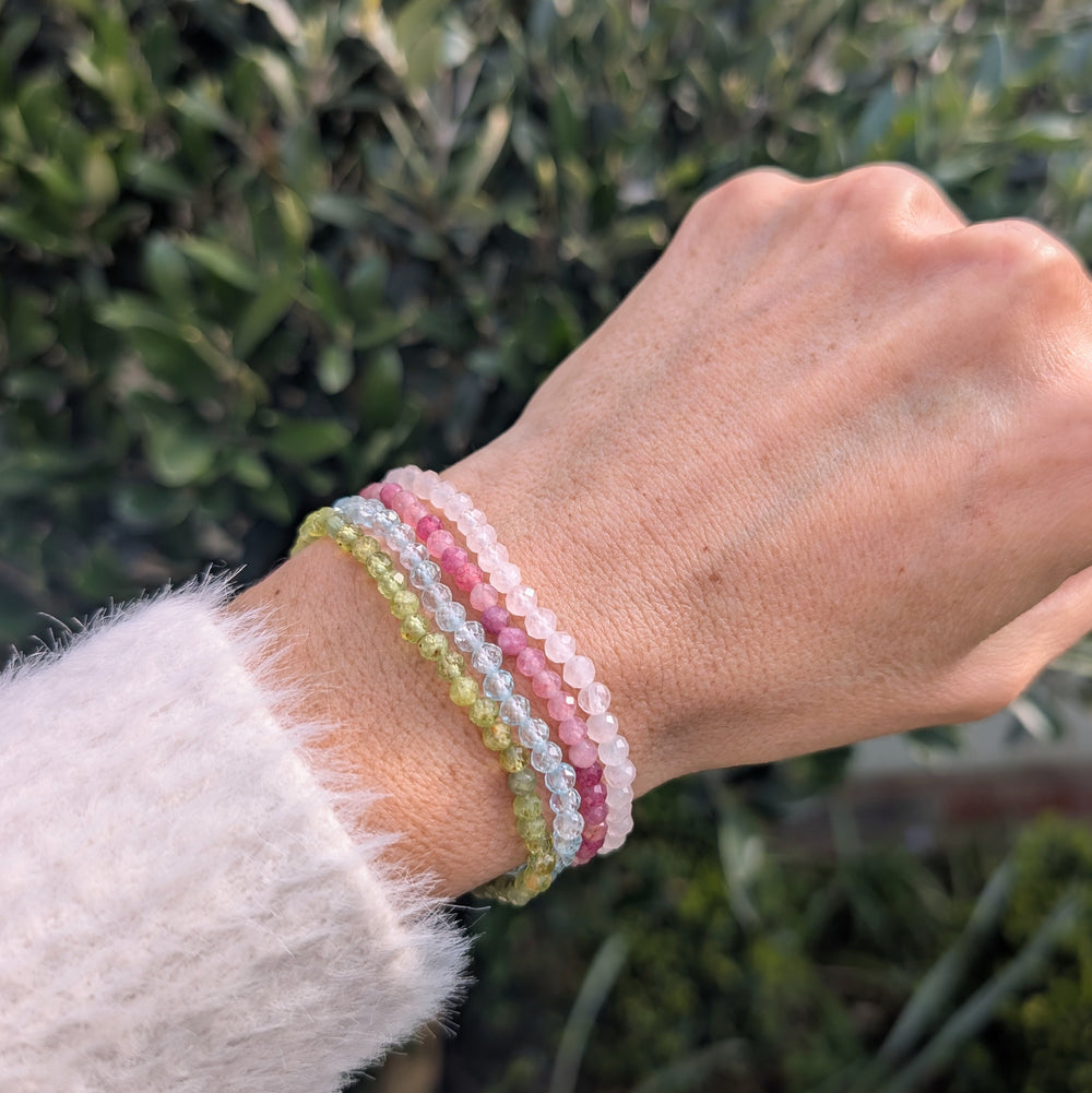 Celebrate friendship gemstone intention bracelet set. Peridot, rose quartz, blue topaz and peridot gemstone bracelets. 