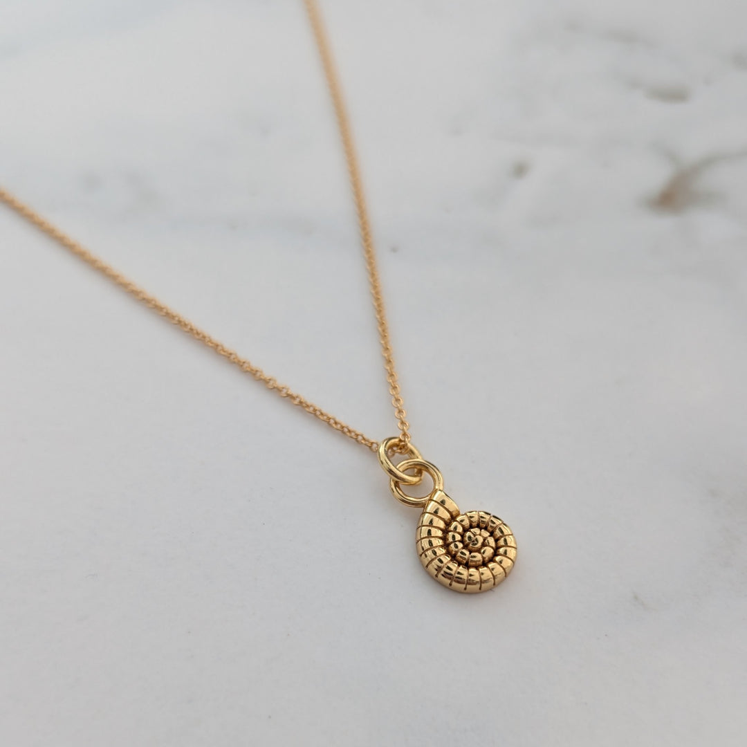 Gold ammonite necklace 