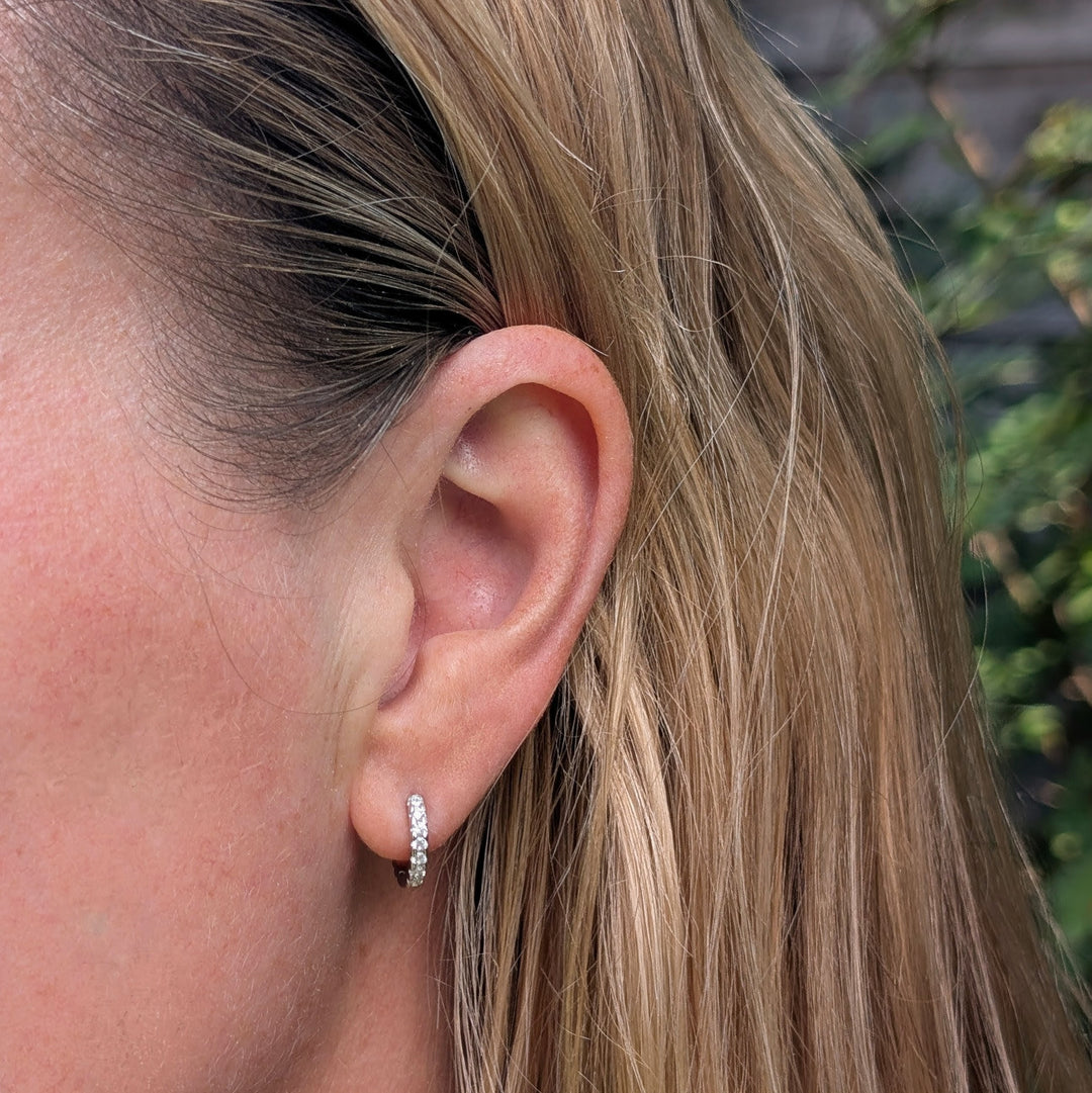 Pair of sterling silver zircon huggie hoop earrings 
