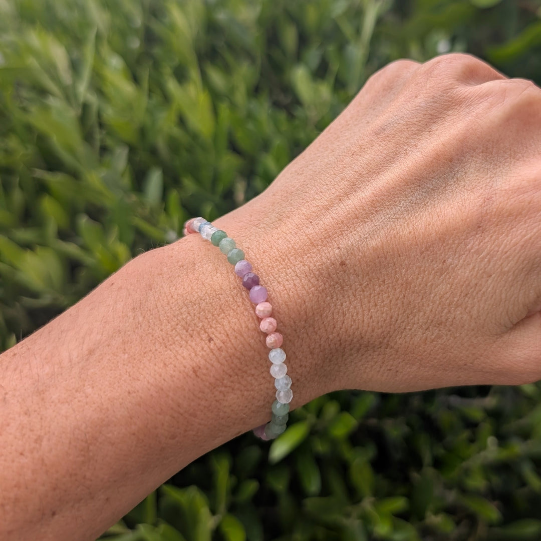 good luck and new ventures gemstone intention bracelet, comprising lepidolite, rhodochrosite, green aventurine and aquamarine faceted beads
