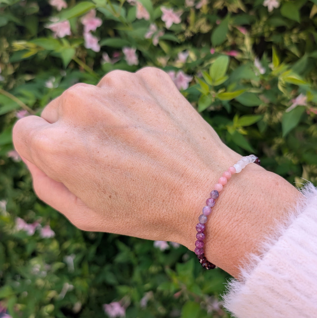 clear quartz, moonstone, rose quartz, pink opal, pink tourmaline, garnet and ruby beaded gemstone bracelet 