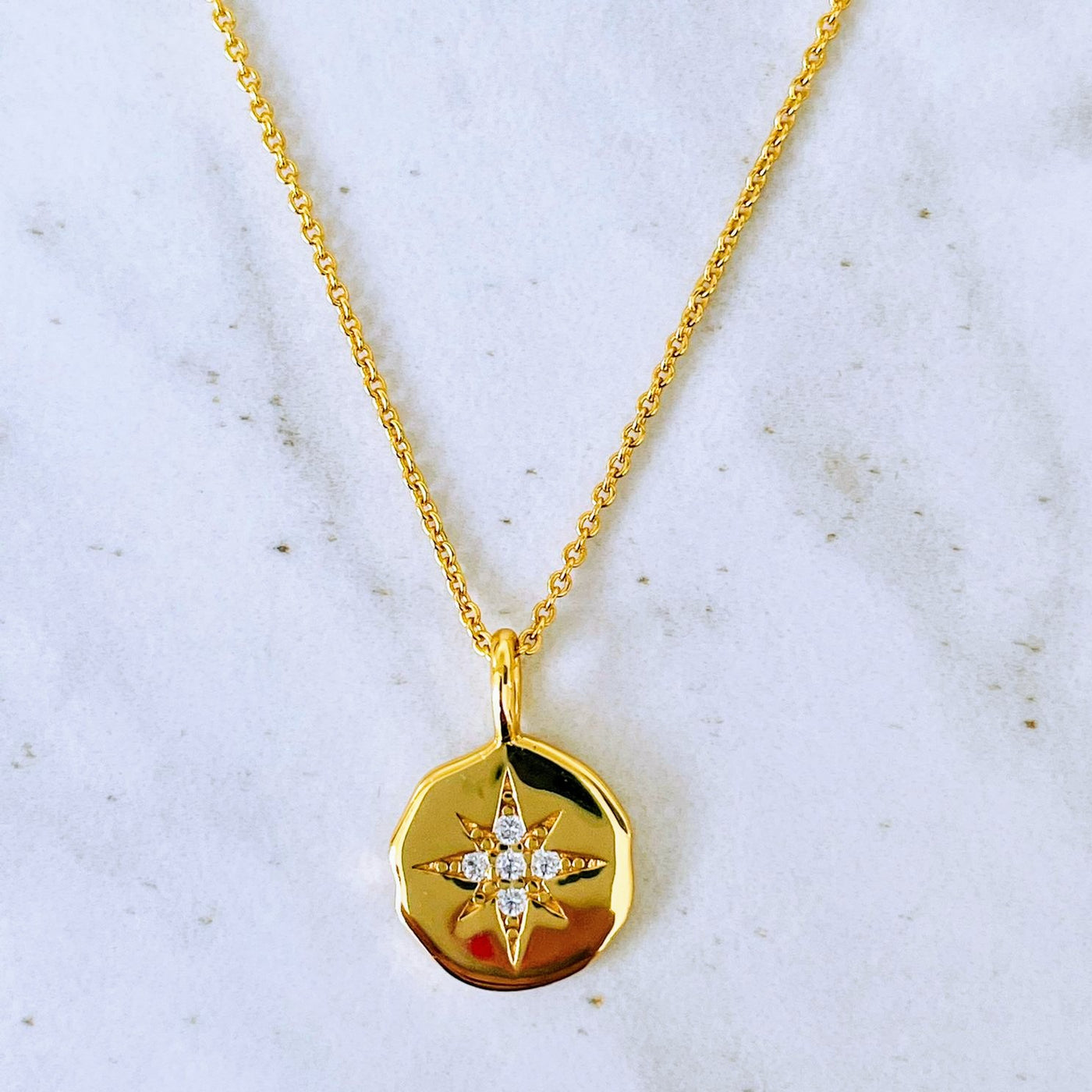 18 carat gold plated starburst disc pendant necklace