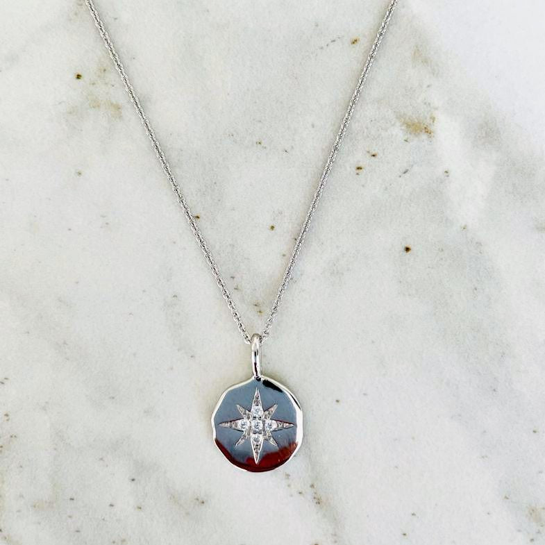 Sterling silver zircon starburst disc pendant necklace 