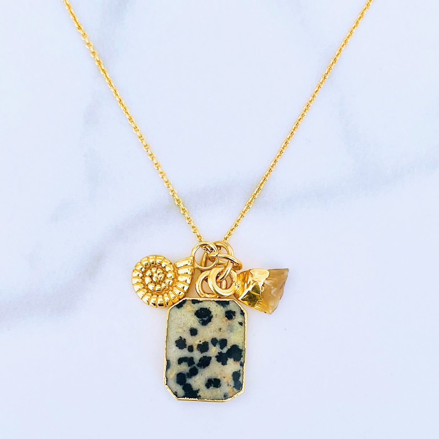 Gold plated dalmatian jasper, citrine and ammonite charm pendant necklace