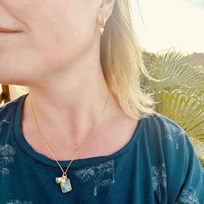 Gold plated K2, aquamarine and palm tree pendant necklace