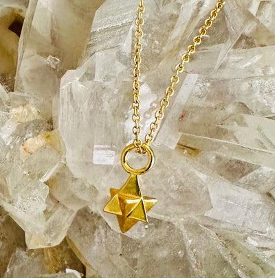 Gold plated tetrahedron pendant necklace