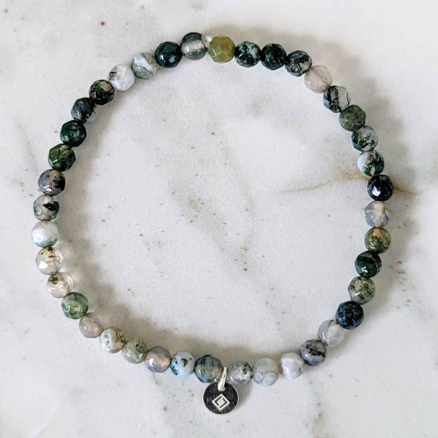 Moss agate 4mm faceted gemstone bracelet with sterling silver circular disc