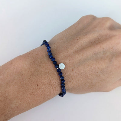 Lapis Lazuli  gemstone bracelet 4mm faceted beads with sterling silver logo disc