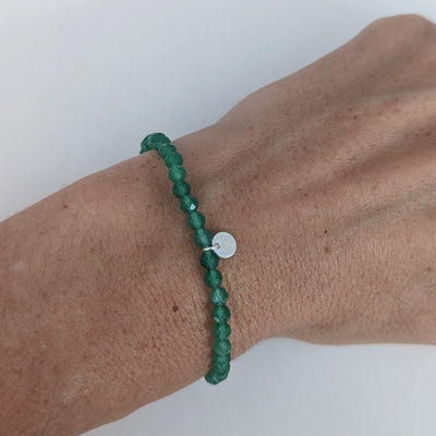 Green Aventurine 4mm faceted gemstone bracelet with sterling silver logo disc