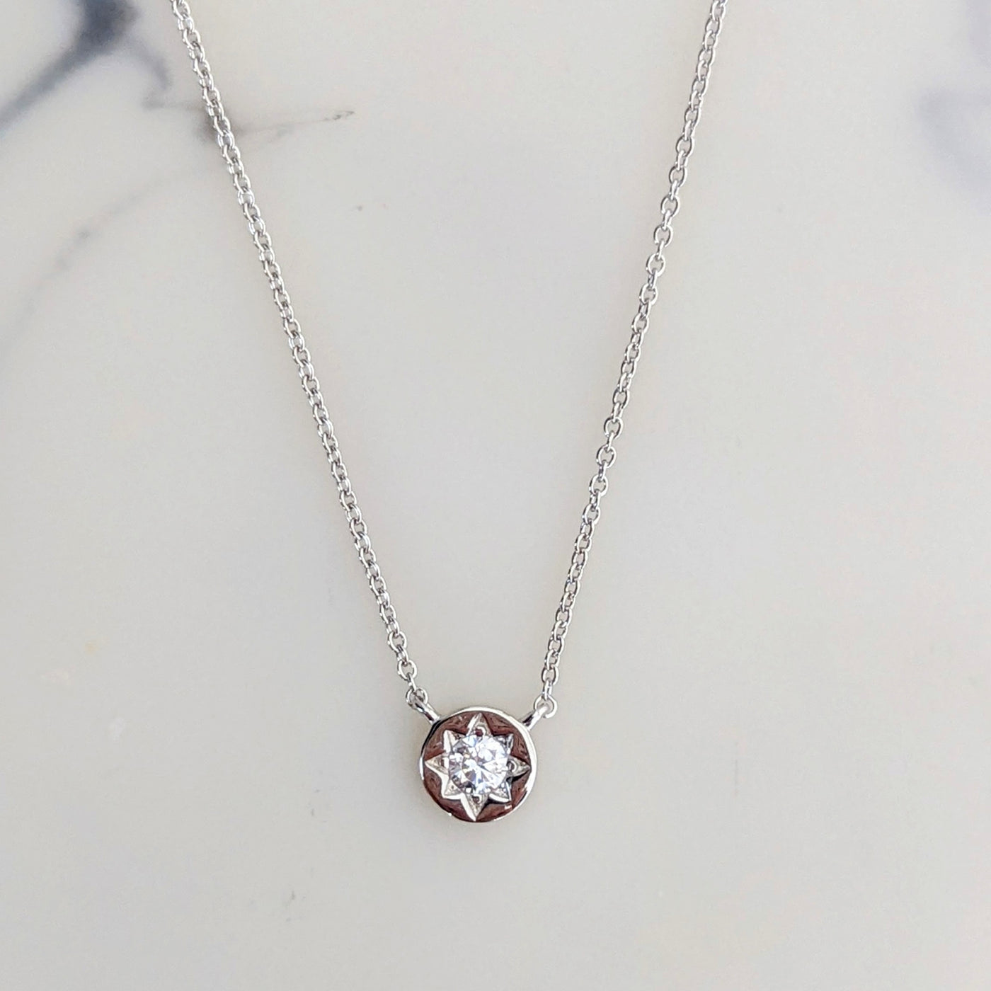 Sterling silver tiny star pendant necklace