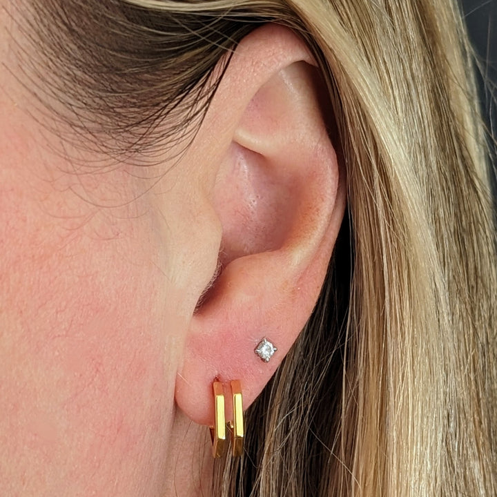 gold plated double hexagon huggie earrings