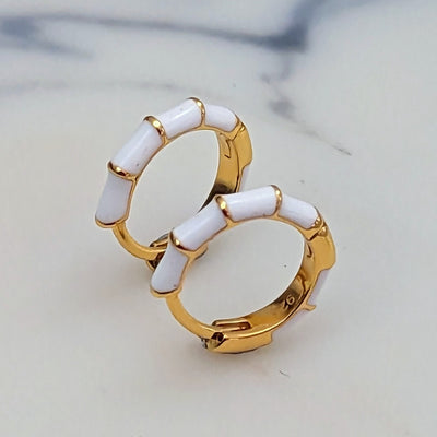 white enamel and gold bamboo huggie hoop earrings