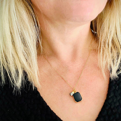    email1678212501074_2  2554 × 2555px  Black onyx and dalmatian jasper gold plated pendant necklace